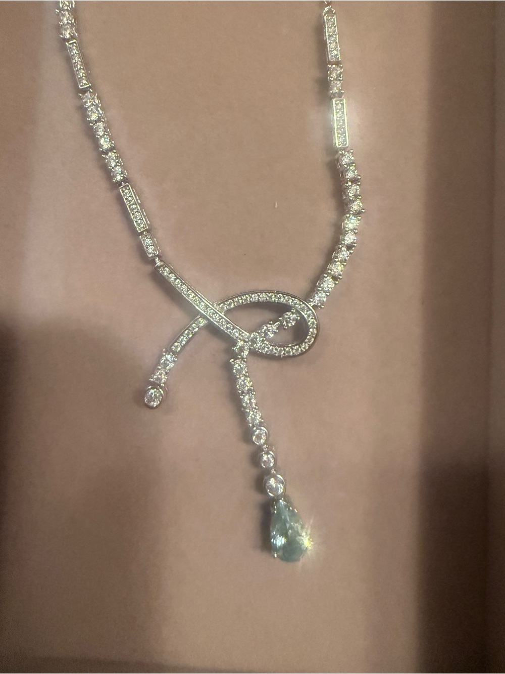 Silver-Tone Crystal Knot Necklace with Aquamarine Drop